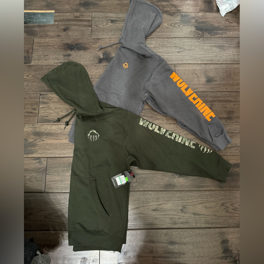 Two Wolverine new w tags. Large adult sweatshirts